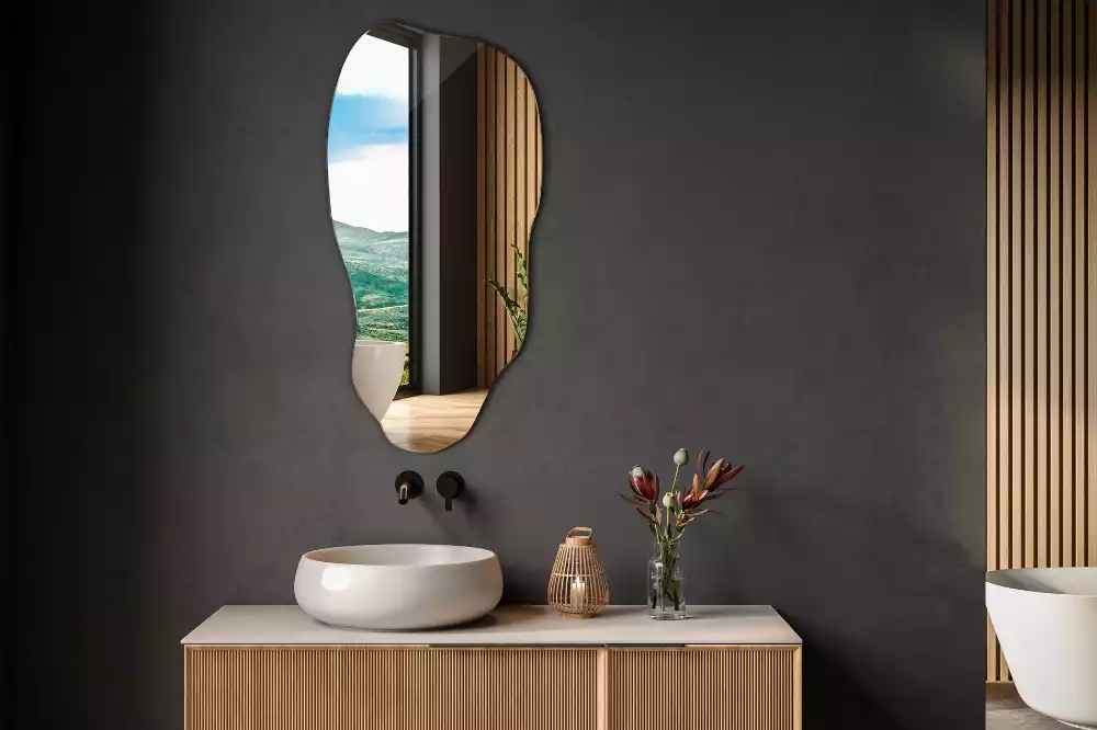 Specchio forma organica macchia da appendere